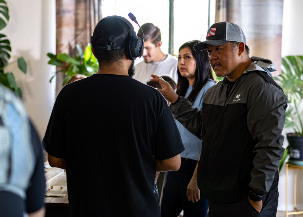 Producer KP Phagnasay on set of The Chicano Story with cast and crew in Fresno, California.